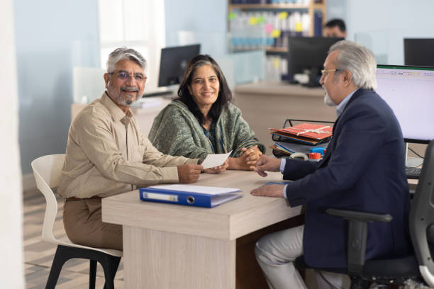 senior couple meeting with financial advisor